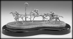 HORSE RACING SCENE SHOWING 3 HORSES JUST PASSING THE WINNING POST 13 INCH LONG. Great gift for the race lover or trophy for best improved jockey.