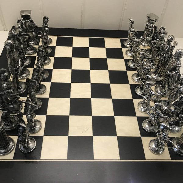 CHESS SET OF ROMAN FIGURES. The Romans once conquered the known world. Great to play chess with real pewter figures. The King is 3 3/4" tall and the pawn is 2 1/4" tall. the board is 14" square. 