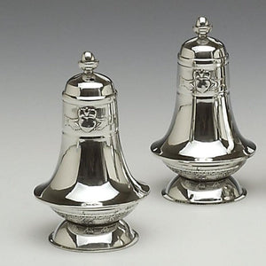 SMALL SALT AND PEPPER SET WITH CELTIC BASE AND CLADDAGH ON THE NECK OF THE SALT AND PEPPER. PEWTER SILVERWARE FINISH AND STAND 3 1/2" TALL. hAND MADE IN IRELAND