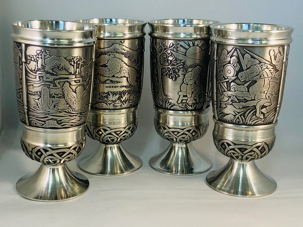 SET OF 4 IRISH LEGEND GOBLETS. THE STORIES OF IRELAND ARE TOLD ON THESE GOBLETS. EACH GOBLET HAS 12OZ CAPACITY AND STAND AT 6" TALL. THE STORIES ARE CHILDREN OF LIR , SALMON OF KNOWLEDGE, HOUND OF CULLAINN ANDCUCHULAINN AND FERDIA. PEWTER SILVERWARE . HANDMADE IN IRELAND 