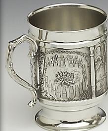 ST.BRIDGET TANKARD tells the story of St. Bridget. the tankard is able to hold 18 fluid ozs and stands over 42 tall. Handmade in IrelandPewter silver finish.. 