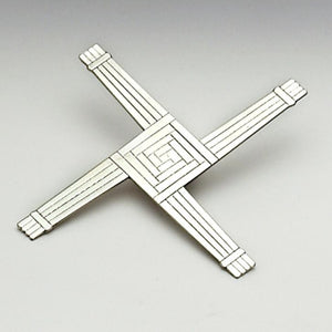 ST.BRIDGET CROSS. WALL HANGING CROSS MADE OF PEWTER ABOUT 8" HIGH. COMES WITH HOOK ON BACK AND POLISHED TO SILVERWARE FINISH. Handmade in Ireland
