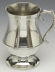 TUDOR STYLE PEWTER TANKARD. This 16 fluid oz tankard makes a great fathers day gift. The tankard stands 52 tall and is both robust and stylish. The pewter is polished to a high silverware finish and has a decorative polished handle. Handmade in Ireland by Mullingar Pewter