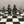 Load image into Gallery viewer, CHESS SET OF VIKING FIGURES. This set replicates the Viking s that invaded Ireland in the 8th and 9th centuries. the king stands at 3 3/4&quot; high and the pawn is 2 1/2&quot; tall. the board is 14&quot; square.  Handmade in Ireland by Mullingar Pewter.
