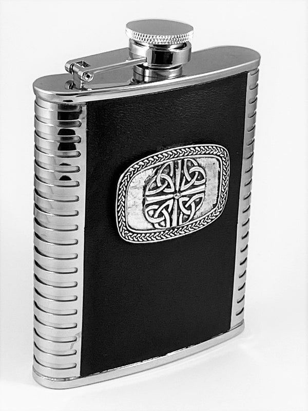 WHISKEY FLASK IN TRINITY 4 DESIGN. THE TRINITY DESIGN IS SUROUNDED IN CELTIC DESIGN AND SITS LOVELY IN THE POCKET . THIS ROBUST FLASK WILL LAST A LIFE TIME. THE FLASK IS 5" TALL AND HOLDS 6 FLUID OZS.