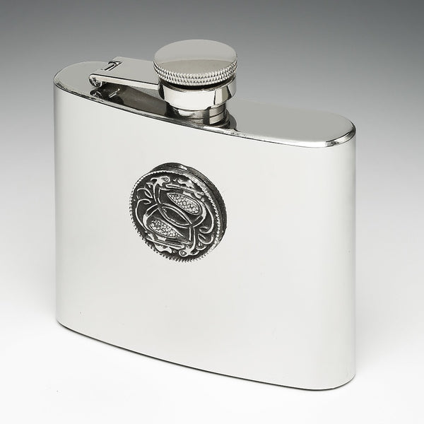 5OZ WHISKEY FLASK made of stainless steel. the flask stands 3" tall and is hip shaped. the Celtic decoration  is from old Irish manuscript. Made in Ireland by Mullingar Pewter