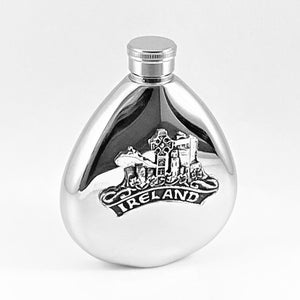 WHISKEY FLASK WITH IRELAND MOTIF IN PEWTER METAL WITH SILVER FINISH. This 5 oz flask makes a great mans gift. With the motifs of Ireland embossed on the side of the flask.