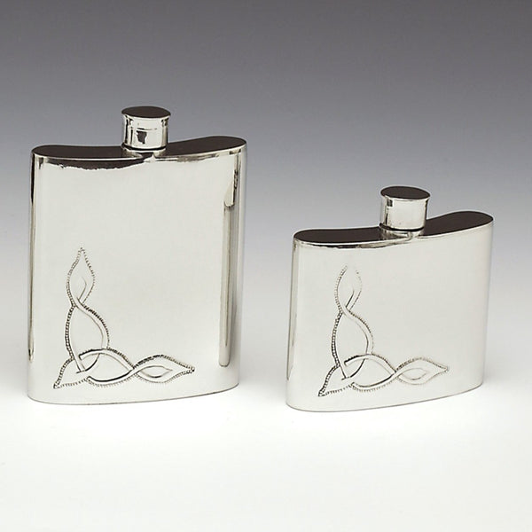 PEWTER WHISKEY FLASKS HANDMADE IN IRELAND WITH CAST PEWTER. BOTH HAVE CELTIC DESIGN AND CAN HOLD 4 FLUID 0OZS AND 6 FLUID OZS.