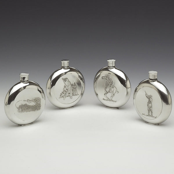 Selection of 4 round pocket cast pewter whiskey flasks all sports related. Polished to a soft silverware /pewter finish. All handmade in Ireland