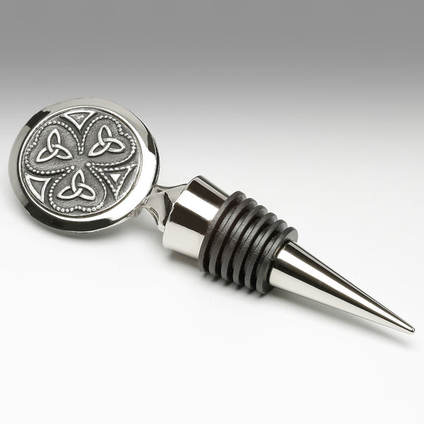 WINE STOPPER WITH SHAMROCK TRINITY DESIGH. THE STOPPER IS 4 1/2" LONG AND FITS THE STANDARD BOTTLE. MADE IN IRELAND