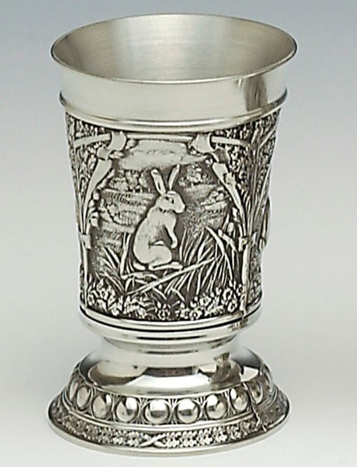 Shot measure with wild life hare scene set in a woodlands setting. The measure is 2" tall and holds one fluid oz . Great house gift. Handmade in Ireland by Mullingar Pewter