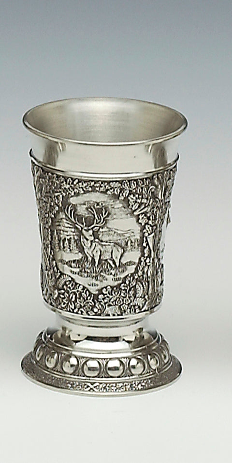 WOODLANDS BEAKER SHOWING WILD LIFE SCENES FROM IRELAND. THE BEAKERS ARE 5 1/2" HIGH AND HOLD 12 FLUID OZS. THE DESIGNS ON THE OUTSIDE OF THE BEAKER ARE THAT OF A STAG IN A FORESTED AREA, DEER  AND WILD TURKEY. GREAT BEAKER FOR A COOL DRINK. PEWTER IN SILVER POLISHED FINISH.