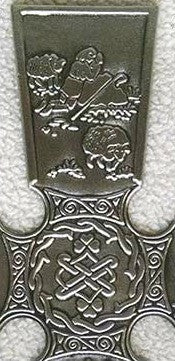 Mullingar Pewter St Patrick's Celtic Cross, central detail and St. Patrick praying on the mountain while minding sheep. Handmade in Ireland