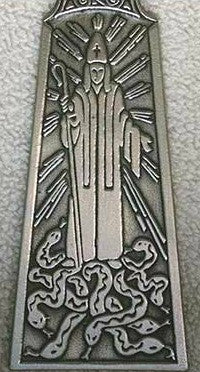 Mullingar Pewter St Patrick's Celtic Cross shows the detail of St. Patrick ridding Ireland of Snakes. Handmade in Ireland