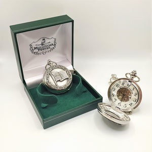 USA Flag present on a Mechanical Pocket Watch. Ideal gift for independence day. The design around the flag is generic paisley. The wtach workings can be seen through the back of the watch also. The watch can  be engraved on the back with a limit of 30 letters. the watch is presented in a green watch box. Made in Ireland by Mullingar Pewter