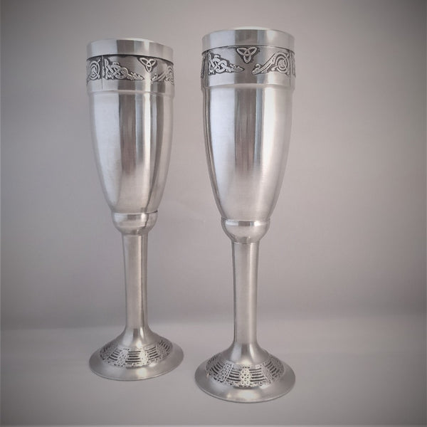 Silver in colour , Mullingar Pewter champagne flute embossed with celtic design on the rim