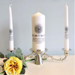 Silver coloured Pewter Unity candle set with claddagh detail.  Picture also includes our collection of candle which is sold separately, and a yellow rose. 